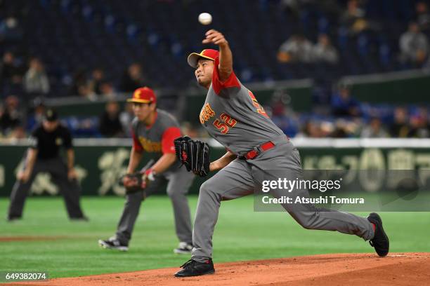 Starting Pitcher Bruce Chen of China throws in the bottom of the first inning during the World Baseball Classic Pool B Game Two between China and...