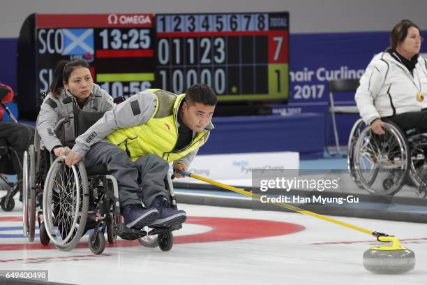 Haitao Wang from China delivers a stone reacts during the World Wheelchair Curling Championship 2017 - test event for PyeongChang 2018 Winter Olympic...