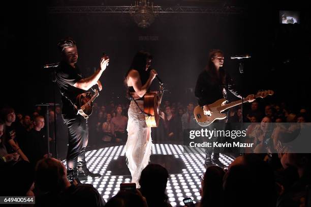 Neil Perry, Kimberly Perry and Reid Perry of The Band Perry perform onstage during their "Welcome To My Bad Imagination - A Series of Pop-up Shows"...