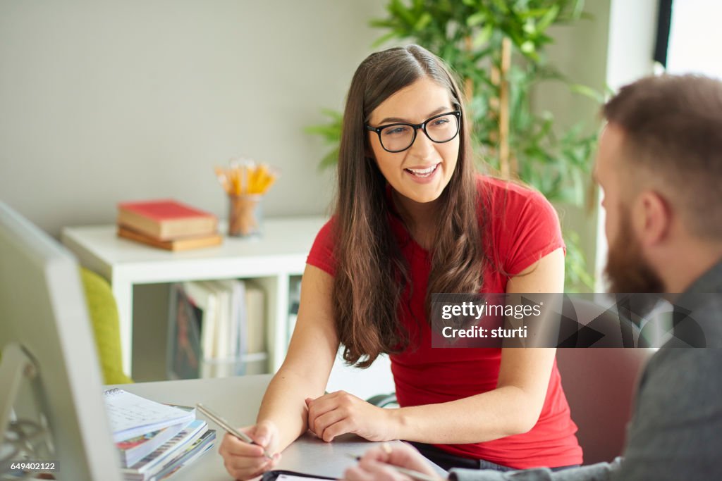 Work colleagues chatting