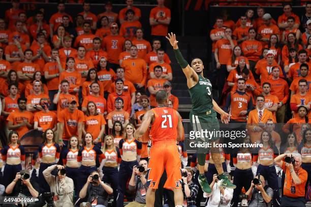 Michigan State Spartans guard Alvin Ellis III goes up to get a hand in the face of Illinois Fighting Illini guard Malcolm Hill during the Big Ten...