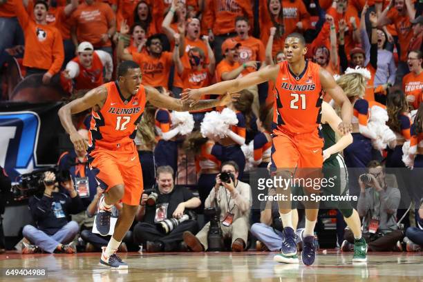 Illinois Fighting Illini forward Leron Black and Illinois Fighting Illini guard Malcolm Hill high five during the Big Ten conference game between the...