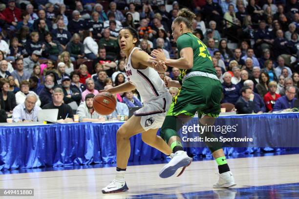 UConn Huskies guard Gabby Williams and USF Bulls forward Tamara Henshaw in action during the first half of the American Athletic Conference Women's...