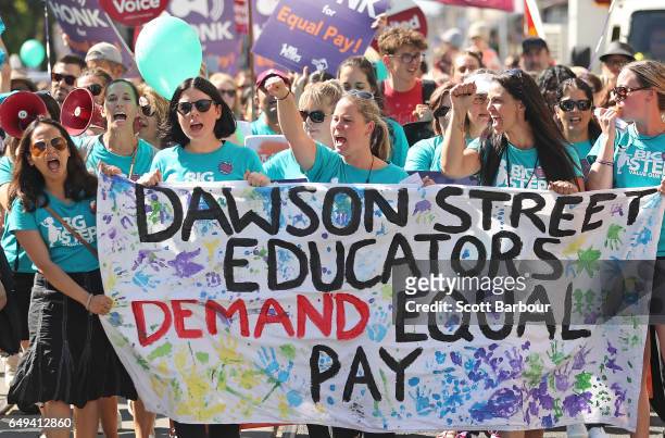 Childcare workers and supporters from Dawson Street Child Care Co-operative walk down Sydney Road during a protest march as part of a campaign for...