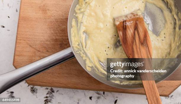 preparing roux. - melting pot foto e immagini stock