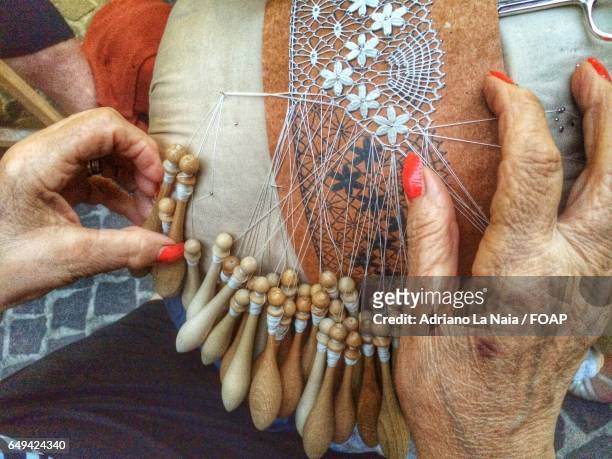 close-up of hand making lace - lacemaking stock pictures, royalty-free photos & images