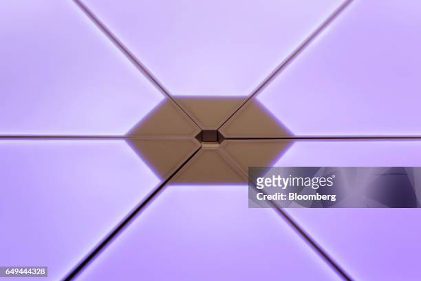 Nanoleaf Aurora modular smart lighting panels sit on display at a SoftBank Corp. +Style media event in Tokyo, Japan, on Wednesday, March 8, 2017....