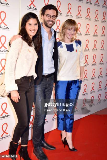 Presenter, Thomas Isle and Maya Lauque attend the Sidaction 2017 Launch Party : Photocall at Musee Branly on March 07, 2017 in Paris, France.