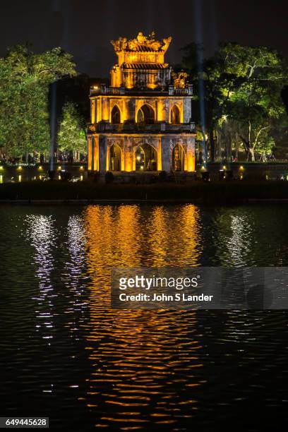 Turtle Pagoda, sitting in the middle of Hoan Kiem Lake or "Lake of the Returned Sword" is in the historical center of Hanoi, the capital of Vietnam....