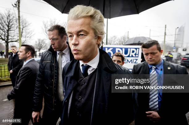 Dutch far-right Freedom Party leader Geert Wilders arrives for a demonstration in front of the Turkish embassy at The Hague on March 8, 2017. Wilders...