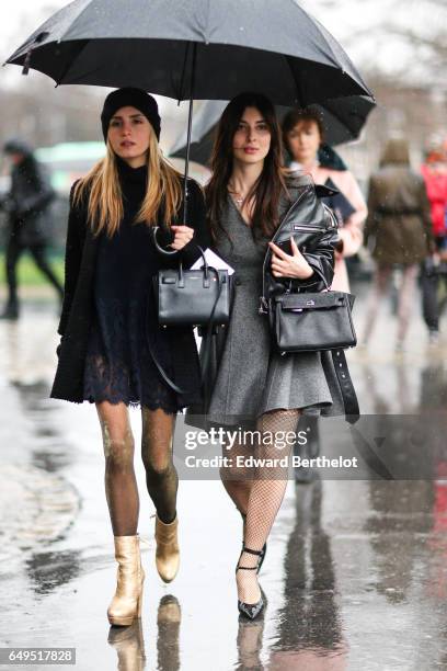 Guests are seen, outside the Elie Saab show, during Paris Fashion Week Womenswear Fall/Winter 2017/2018, on March 4, 2017 in Paris, France.