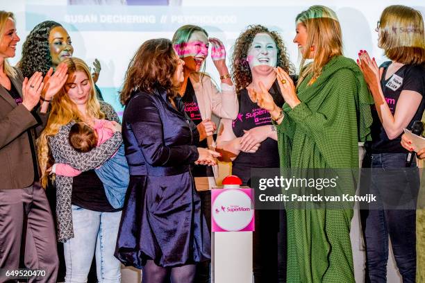 Queen Maxima of The Netherlands attends a meeting at Foundation Single Supermom on International Women's Day on March 8, 2017 in Amsterdam,...