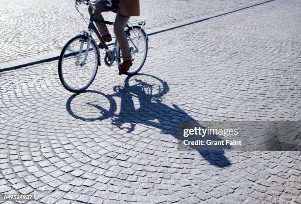 bicycle shadow. - belgium training stockfoto's en -beelden