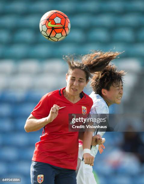 Ingrid Moe Wold of Norway and Yuka Momiki of Japan during the Group B 2017 Algarve Cup match between Norway and Japan at the Estadio Algarve on March...