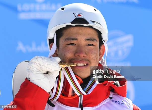Gold medalist Ikuma Horishima of Japan poses during the medal ceremony for the Men's Moguls on day one of the FIS Freestyle Ski & Snowboard World...