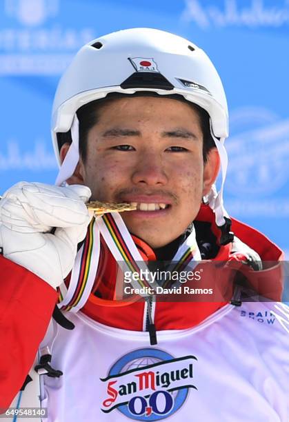 Gold medalist Ikuma Horishima of Japan poses during the medal ceremony for the Men's Moguls on day one of the FIS Freestyle Ski & Snowboard World...