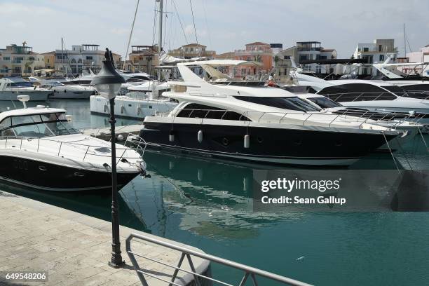 Yachts and luxury residences stand at Limassol Marina on March 8, 2017 in Limassol, Cyprus. Cyprus has largely recovered from its 2012-2013 economic...