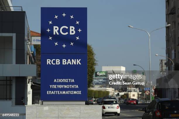 Branch of Russian-owned RCB bank stands on March 8, 2017 in Nicosia, Cyprus. Cyprus has largely recovered from its 2012-2013 economic crisis. The...