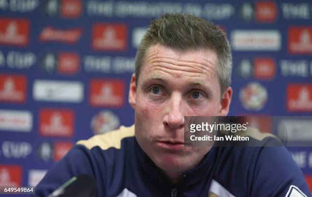 Neil Harris, Millwall manager, speaks to the media during the Millwall Press Conference ahead of Sunday's FA Cup fixture against Tottenham Hotspur at...