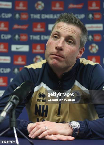 Neil Harris, Millwall manager, speaks to the media during the Millwall Press Conference ahead of Sunday's FA Cup fixture against Tottenham Hotspur at...