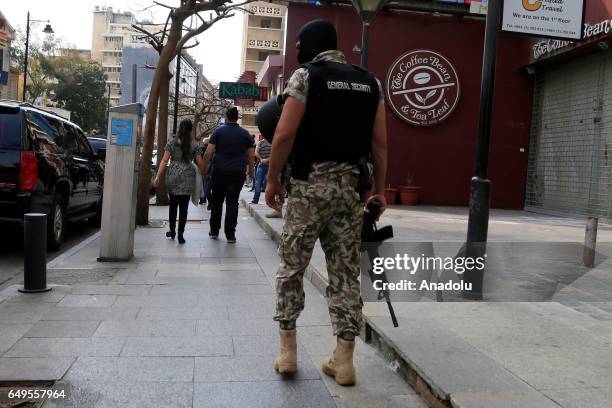 Lebanese security forces carry out an anti-terror operation against certain exchange offices and money transfer companies, which were allegedly...