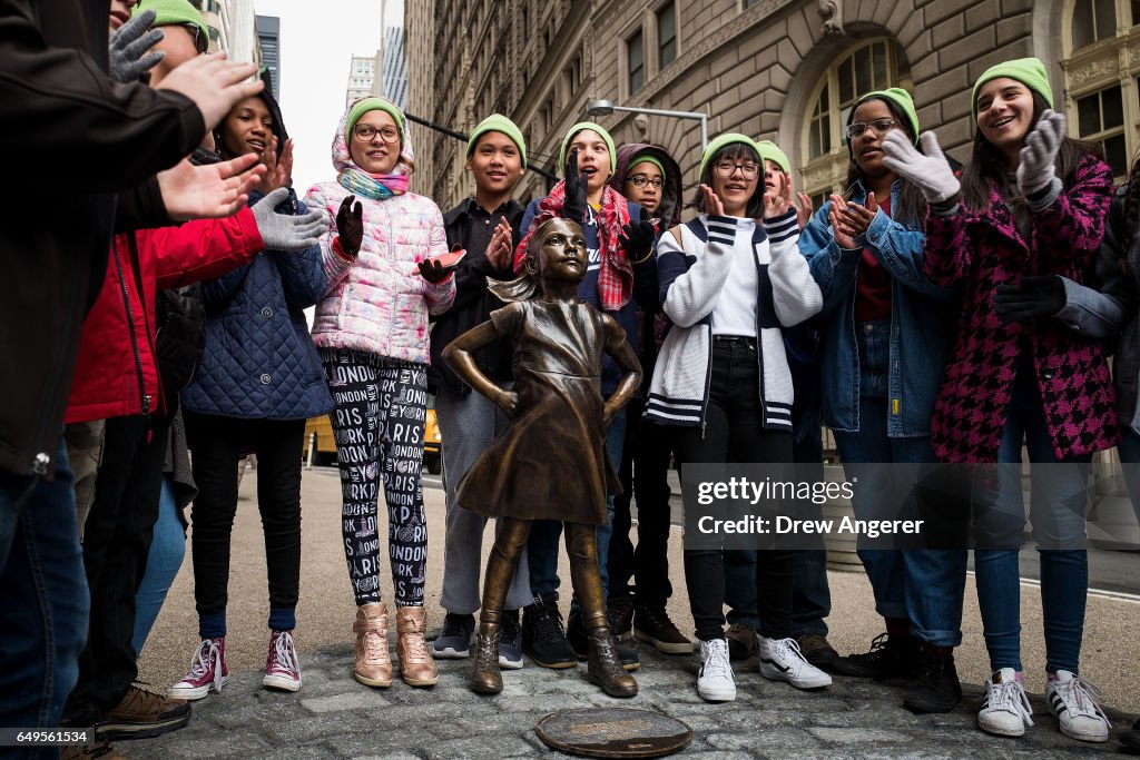 Statue Of Defiant Girl Installed In Front Of Iconic Wall Street Bull By Global Investment Firm