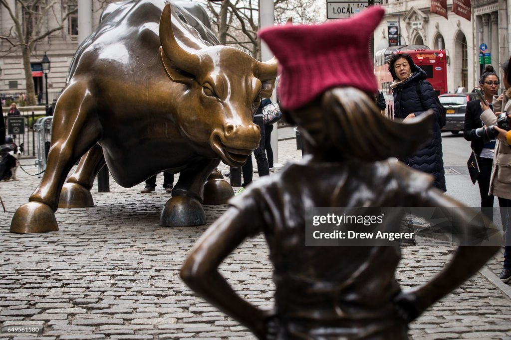 Statue Of Defiant Girl Installed In Front Of Iconic Wall Street Bull By Global Investment Firm