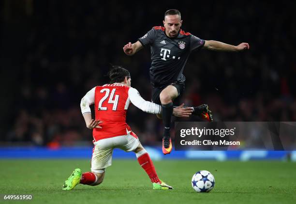 Franck Ribery of Bayern Muenchen evades Hector Bellerin of Arsenal during the UEFA Champions League Round of 16 second leg match between Arsenal FC...
