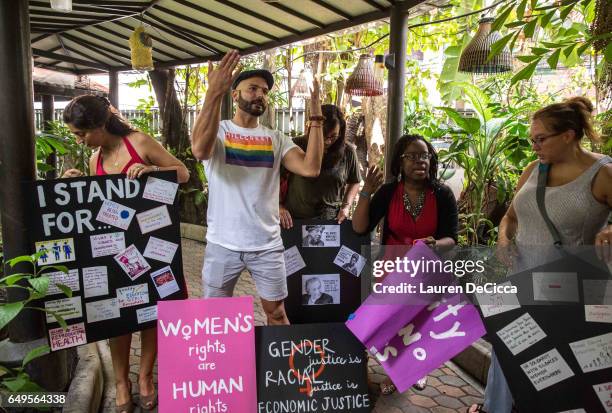 Women and men meet at the Women's Strike Bangkok to discuss the furture of women's rights and stand in solidarity with women around the world on...