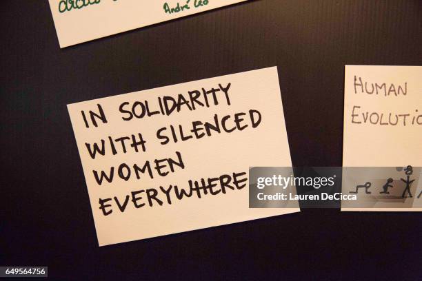 Women posted index cards stating why they stand for women's rights on March 8, 2017 in Bangkok, Thailand. International Women's Day was first marked...