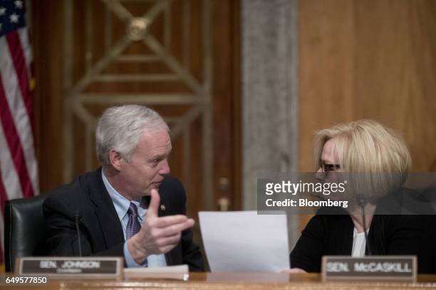 Senator Ron Johnson, a Republican from Wisconsin and chairman of the Senate Homeland Security and Governmental Affairs Committee, left, speaks with...