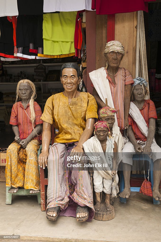 Torajan cliff burial effigy figures (tau tau)