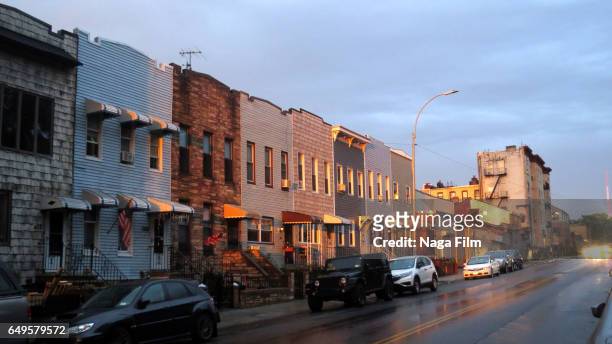 city street at sunset in brooklyn new york. - brooklyn new york stock pictures, royalty-free photos & images