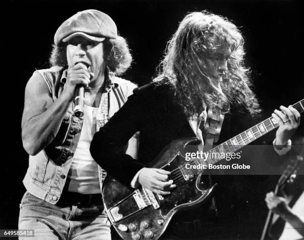 Vocalist Brian Johnson, left, and guitarist Angus Young perform with AC/DC at the Worcester Centrum in Worcester, MA on Sep. 6, 1985.