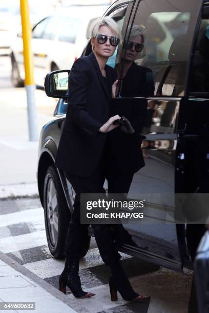 Lara Bingle, Sam Worthington and their son Rocket leave Sydney on December 1, 2015 in Sydney, Australia.