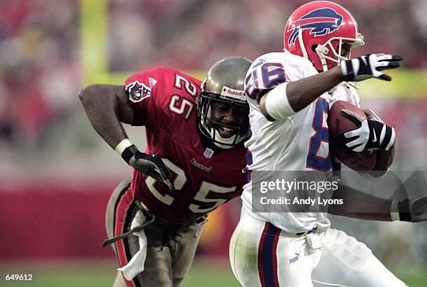 Brian Kelly of the Tampa Bay Buccaneers takes down Jermy McDaniel of the Buffalo Bills during the game at the Raymond James Stadium in Tampa,...