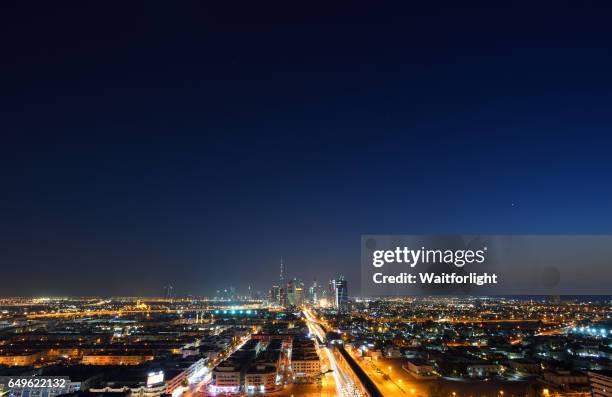 Skyline Of Dubai At Night High-Res Stock Photo