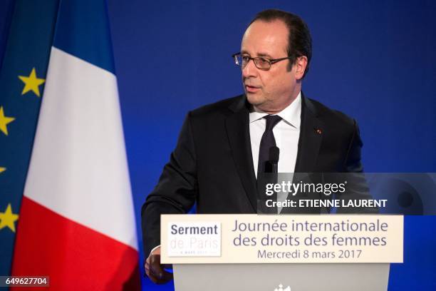 French President Francois Hollande delivers a speech during a meeting as part of the 40th International Women's Day on March 8 at the French Foreign...