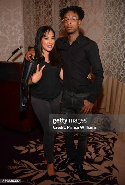 Jennifer Drake and 21 Savage attend a Private Dinner Supporting Candidate Kwanza Hall at the Georgian Terrace Hotel on March 7, 2017 in Atlanta...