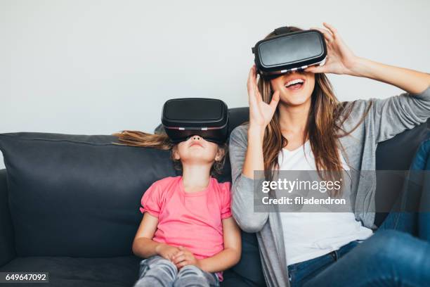 virtual reality simulator - 3d daughter stock pictures, royalty-free photos & images