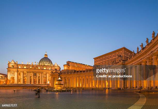 saint peter basilica at the vatican illuminated at night, rome, lazio, italy - vatican stock pictures, royalty-free photos & images