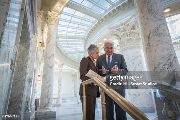 caucasian senator talking in capitol - collaboration government stock pictures, royalty-free photos & images