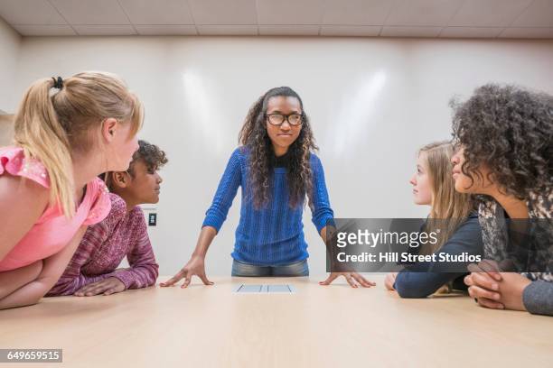 students talking in study meeting - ten to fifteen stock pictures, royalty-free photos & images