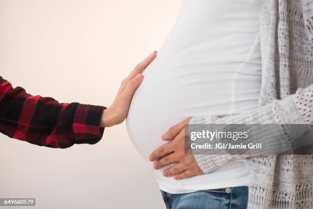 Pregnant Belly Moving Photos and Premium High Res Pictures - Getty Images