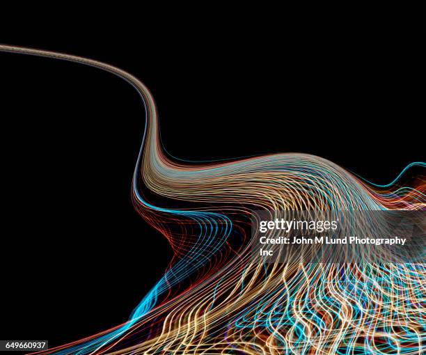 time lapse view of light streams - accelerate complex stock pictures, royalty-free photos & images