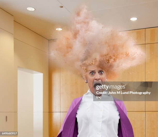 head of caucasian businesswoman exploding - american red cross fotografías e imágenes de stock