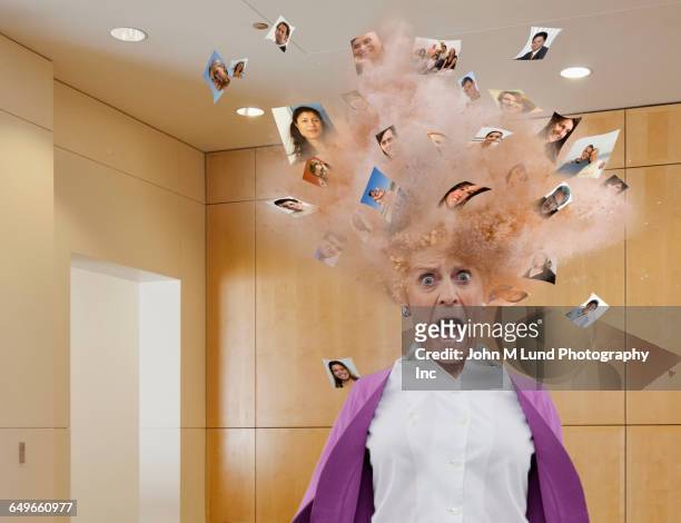 head of businesswoman exploding with images of faces - teenager alter stock-fotos und bilder