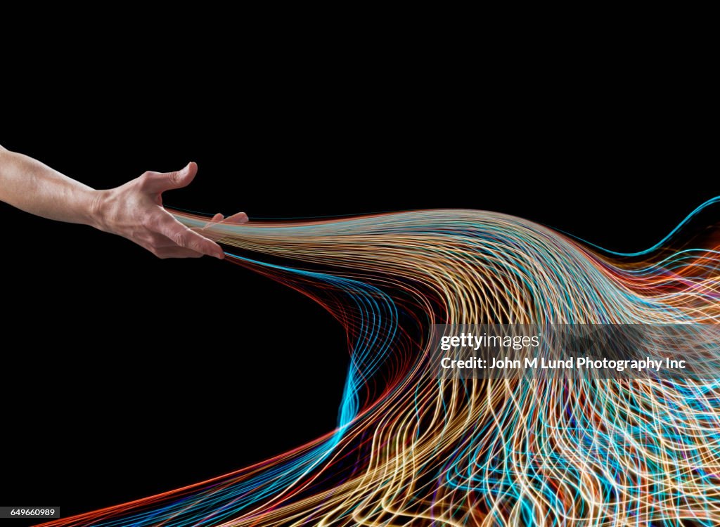 Hand releasing light streams
