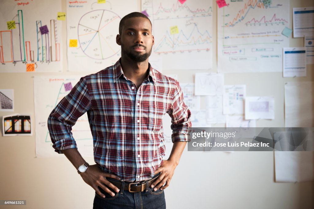 African American businessman standing in office