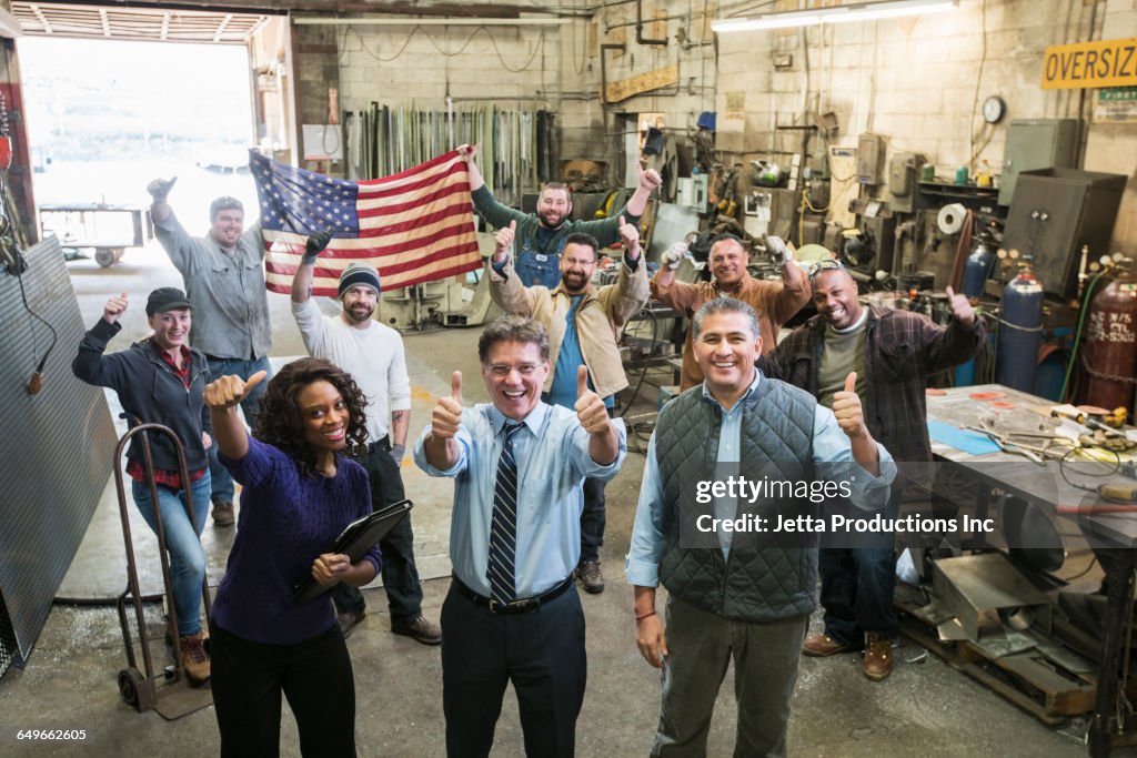 Workman Cheering High Angle View Of Workers Cheering In Workshop High-Res Stock Photo ...